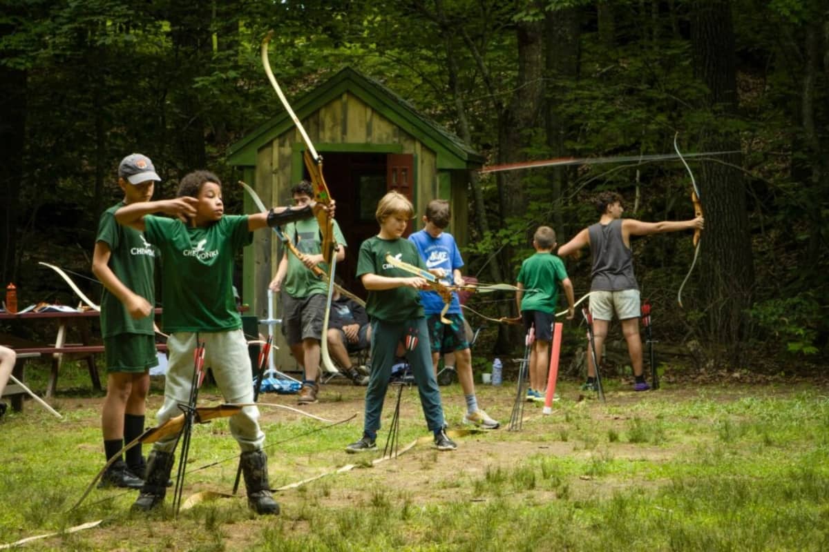 Kids using the archery range at Camp Chewonki