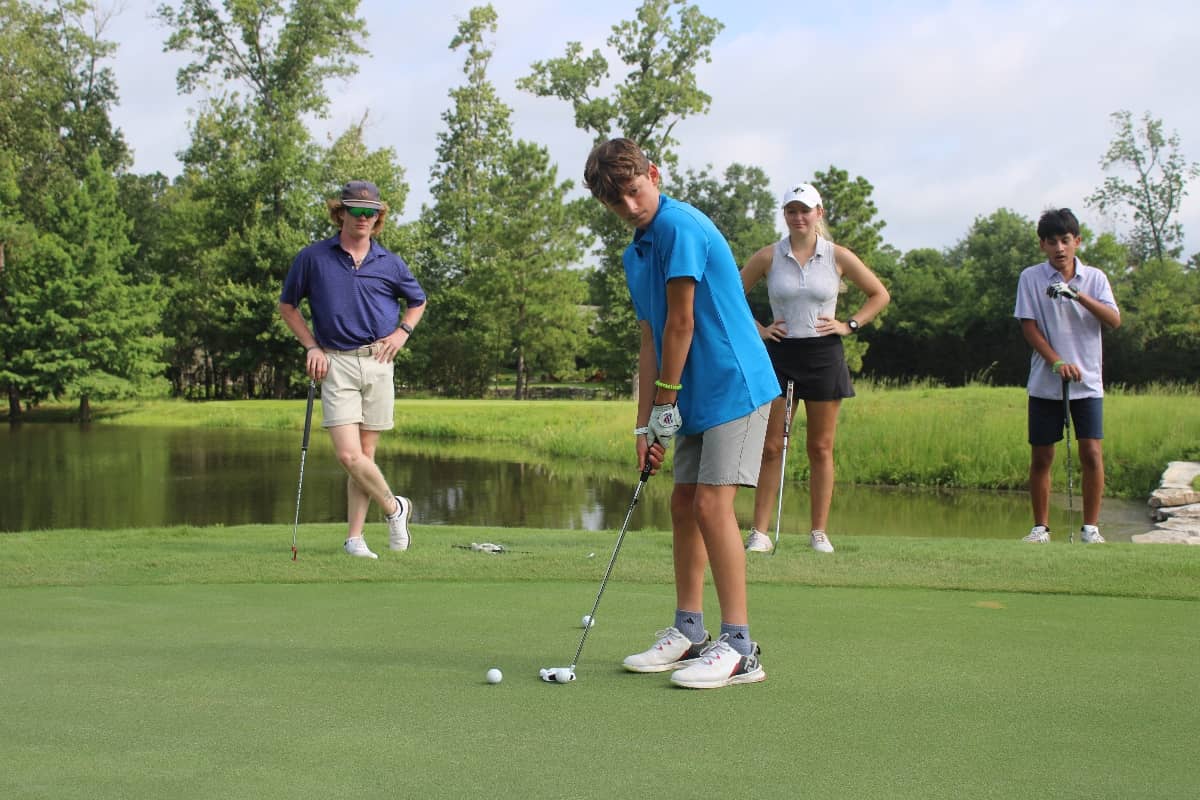 Campers playing golf
